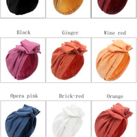 Muslim-style mirror hats and African headgear for women by MANDOTOS INTERNATIONAL, featuring colorful embroidery and decorative mirrors.