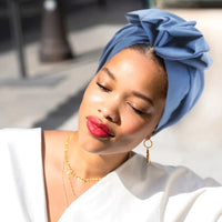 Muslim-style mirror hats and African headgear for women, featuring intricate designs and vibrant patterns by MANDOTOS INTERNATIONAL.