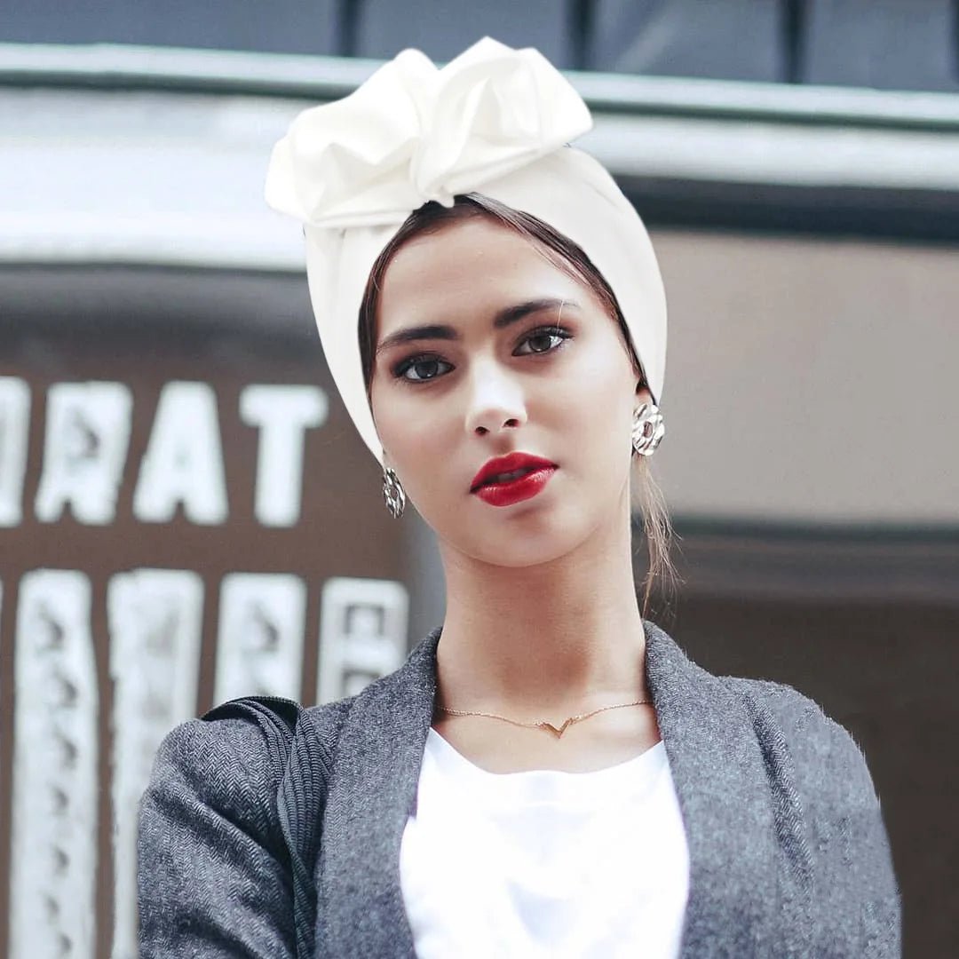 Muslim-style mirror hats and African headgear for women, featuring intricate designs and reflective mirror embellishments.