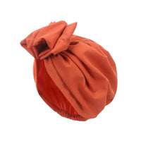 Muslim-style mirror hats and African headgear for women by MANDOTOS INTERNATIONAL, featuring intricate mirror embellishments and vibrant designs.