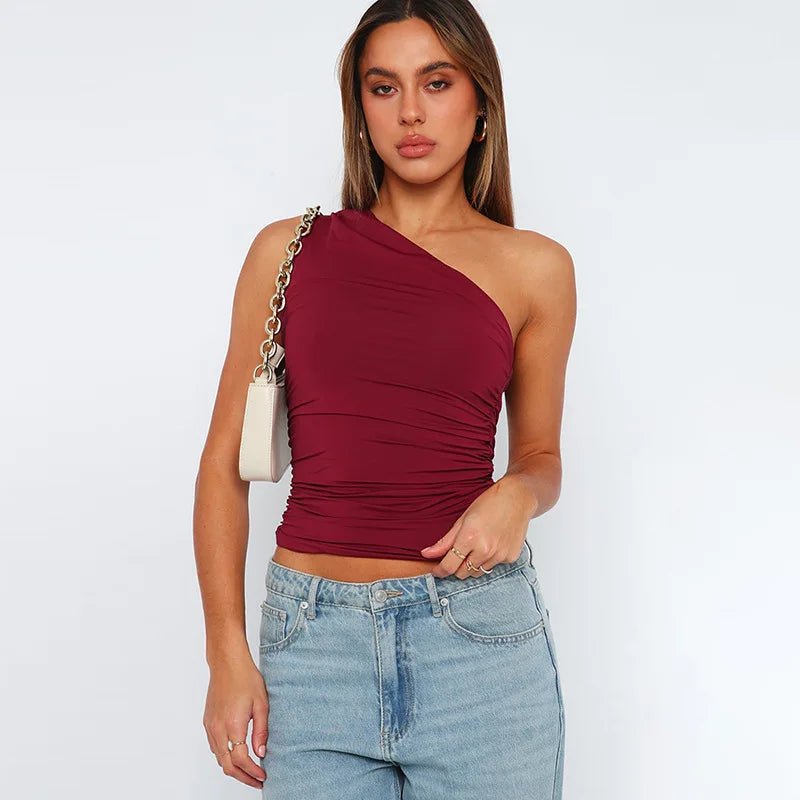 Mandotos International one shoulder backless tank top in candy color, sleeveless casual T-shirt for women.