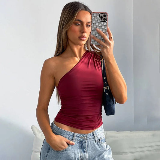Mandotos International one-shoulder backless tank top in candy color, sleeveless casual T-shirt for women.