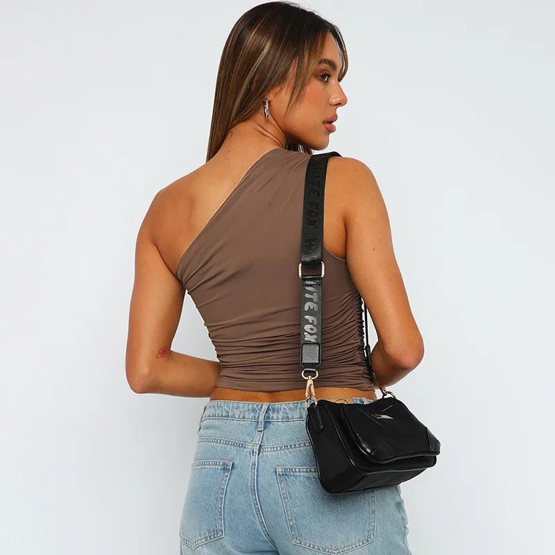 Mandotos International one-shoulder backless tank top in candy color, sleeveless casual T-shirt with stylish design.