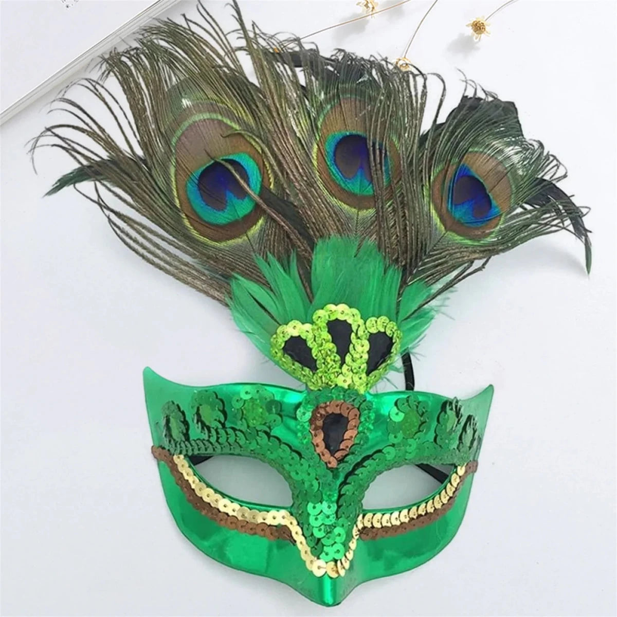 Peacock feather headpiece for women, perfect for Halloween, Mardi Gras, Carnival, and cosplay events by MANDOTOS INTERNATIONAL.