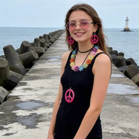 PESENAR 60s hippie costume accessory set with flower headband, pink sunglasses, and peace sign jewelry by MANDOTOS INTERNATIONAL