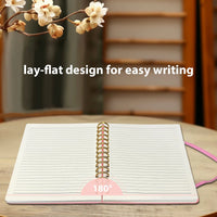 Pink girls' A5 travel leather spiral notebook with pen holder and pen, ideal for writing and note-taking.