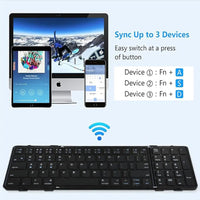 Mandotos International portable foldable wireless keyboard with numeric keypad, compact design for easy portability.