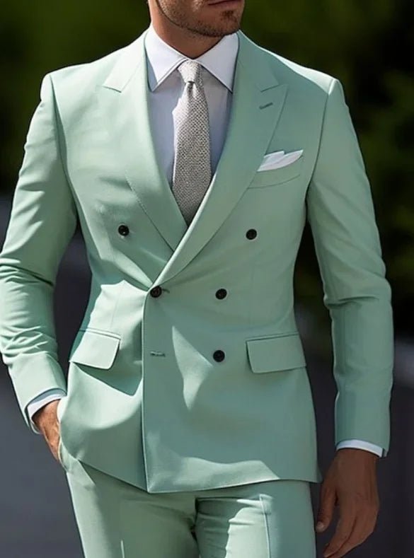 Elegant brown men's bespoke double-breasted slim fit formal suit set by MANDOTOS INTERNATIONAL, displayed on a hanger.