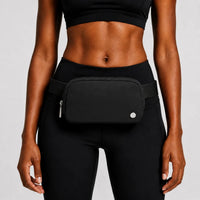 Mandotos International premium lightweight women’s waist bag for running and travel, shown in a sleek design suitable for active use.