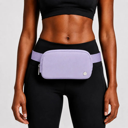 Mandotos International premium lightweight women's waist bag for running and travel, shown in black with adjustable strap.