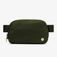 Mandotos International lightweight women's waist bag for running and travel, shown with adjustable strap and spacious compartment.