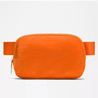 Mandotos International premium lightweight women's waist bag for running and travel, shown in black with adjustable strap.