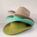 Premium suede cowboy hat by MANDOTOS INTERNATIONAL, stylish outdoor accessory for men and women, perfect for festivities and outdoor events.