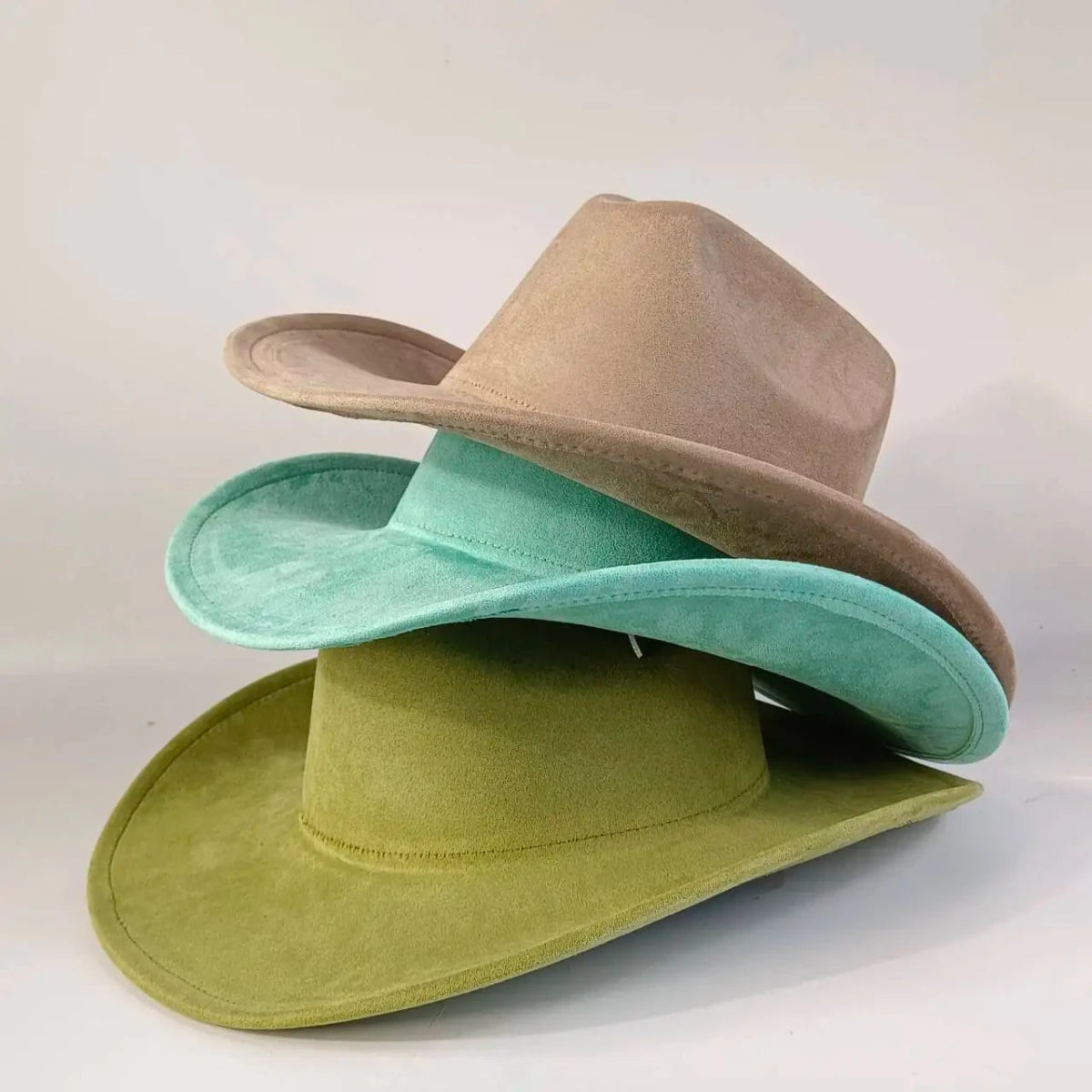 Premium suede cowboy hat by MANDOTOS INTERNATIONAL, stylish outdoor accessory for men and women, perfect for festivities and outdoor events.