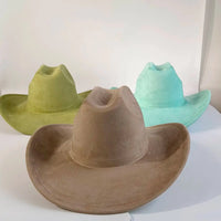 Premium suede cowboy hat by MANDOTOS INTERNATIONAL featuring a wide brim and stylish design for outdoor festivities.