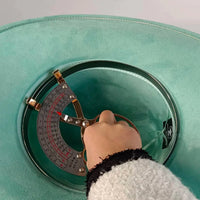 Premium suede cowboy hat by MANDOTOS INTERNATIONAL, stylish unisex outdoor hat with wide brim and classic Western design.