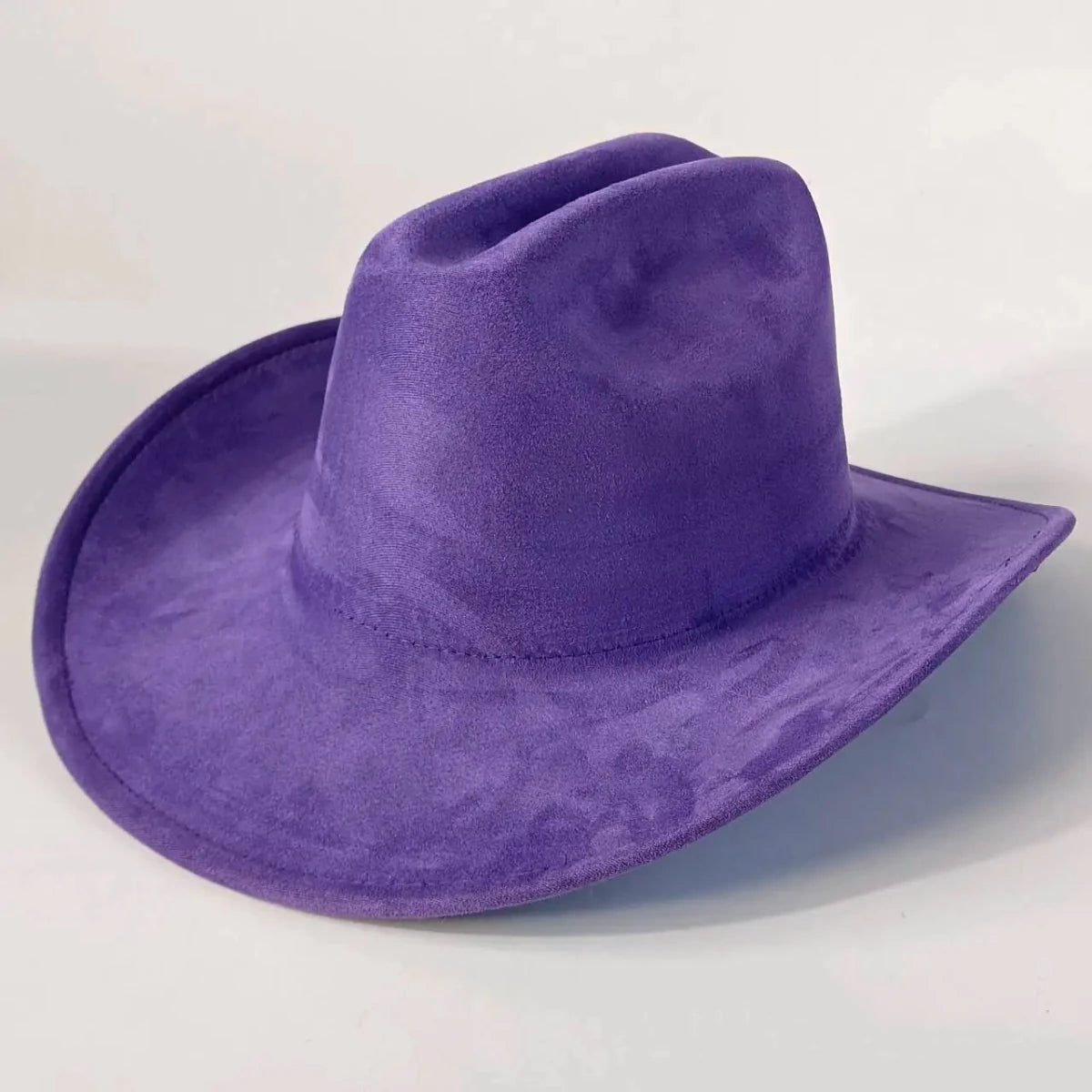 Premium suede cowboy hat by MANDOTOS INTERNATIONAL, stylish for men and women, perfect for outdoor festivities and events.