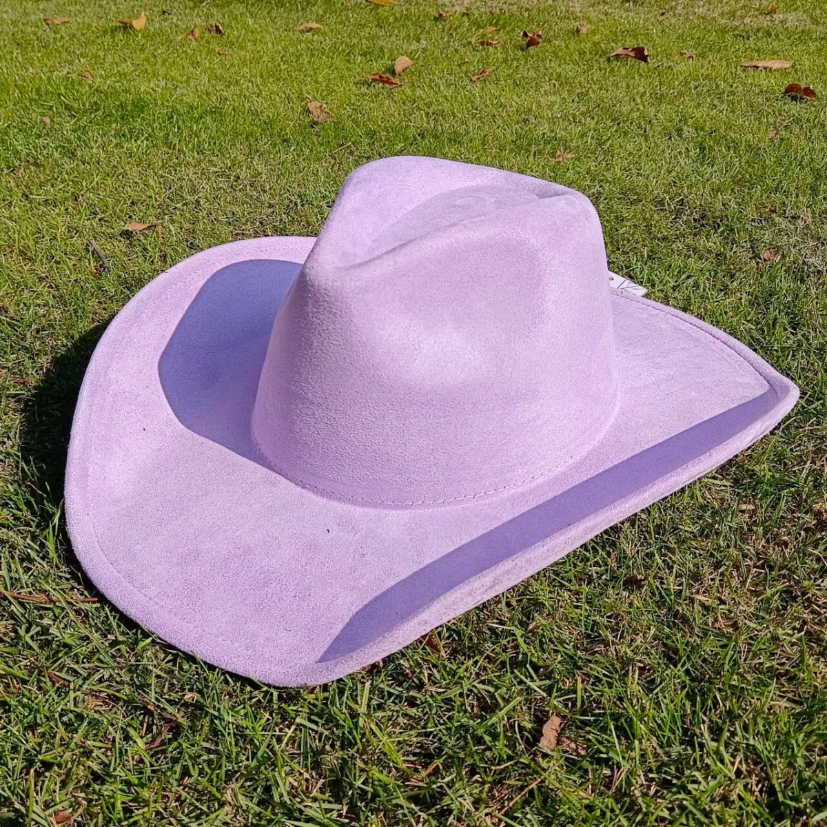 Premium suede cowboy hat by MANDOTOS INTERNATIONAL, stylish outdoor hat for men and women with wide brim and classic design.