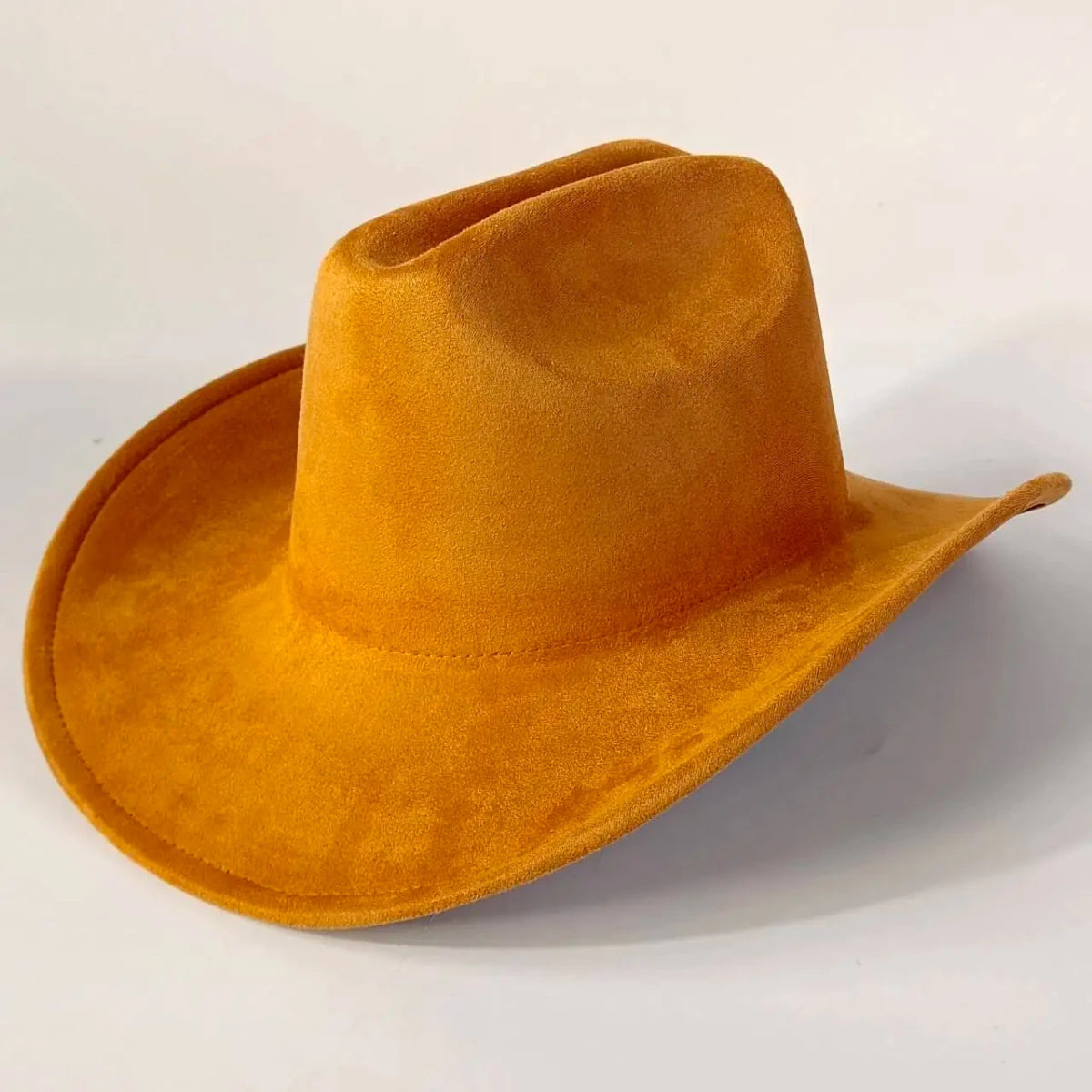 Premium suede cowboy hat by MANDOTOS INTERNATIONAL, stylish unisex hat perfect for outdoor festivities and casual wear.