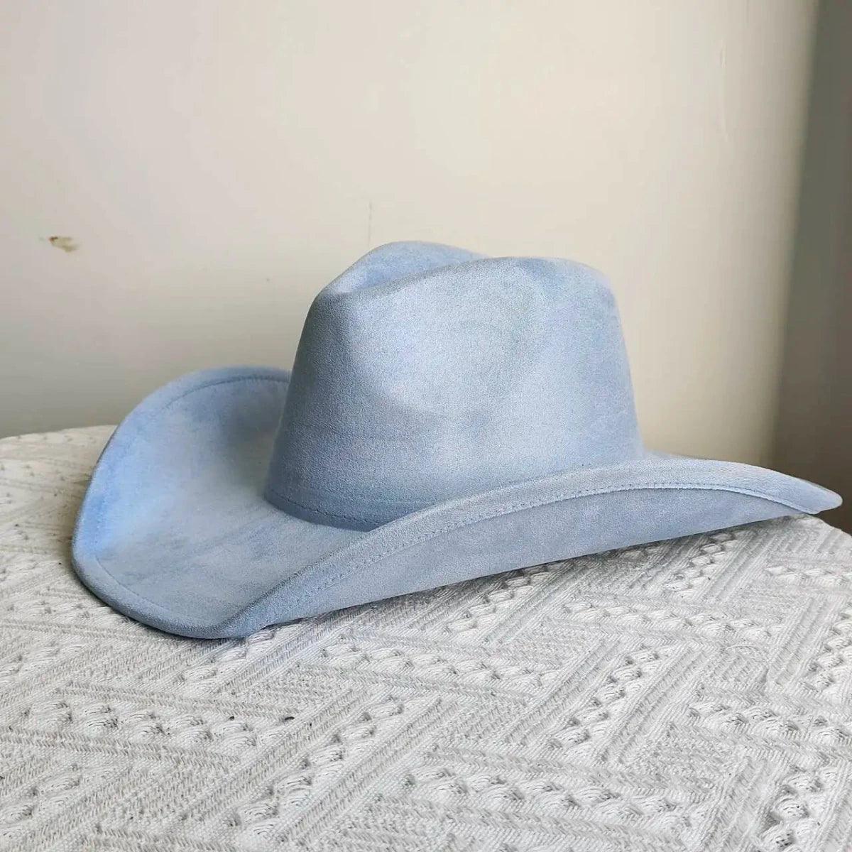 Premium suede cowboy hat by MANDOTOS INTERNATIONAL, stylish unisex hat with wide brim, perfect for outdoor festivities and outdoor wear.