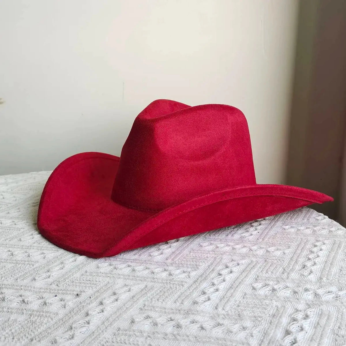 Premium suede cowboy hat by MANDOTOS INTERNATIONAL, stylish unisex outdoor hat with wide brim and classic Western design.