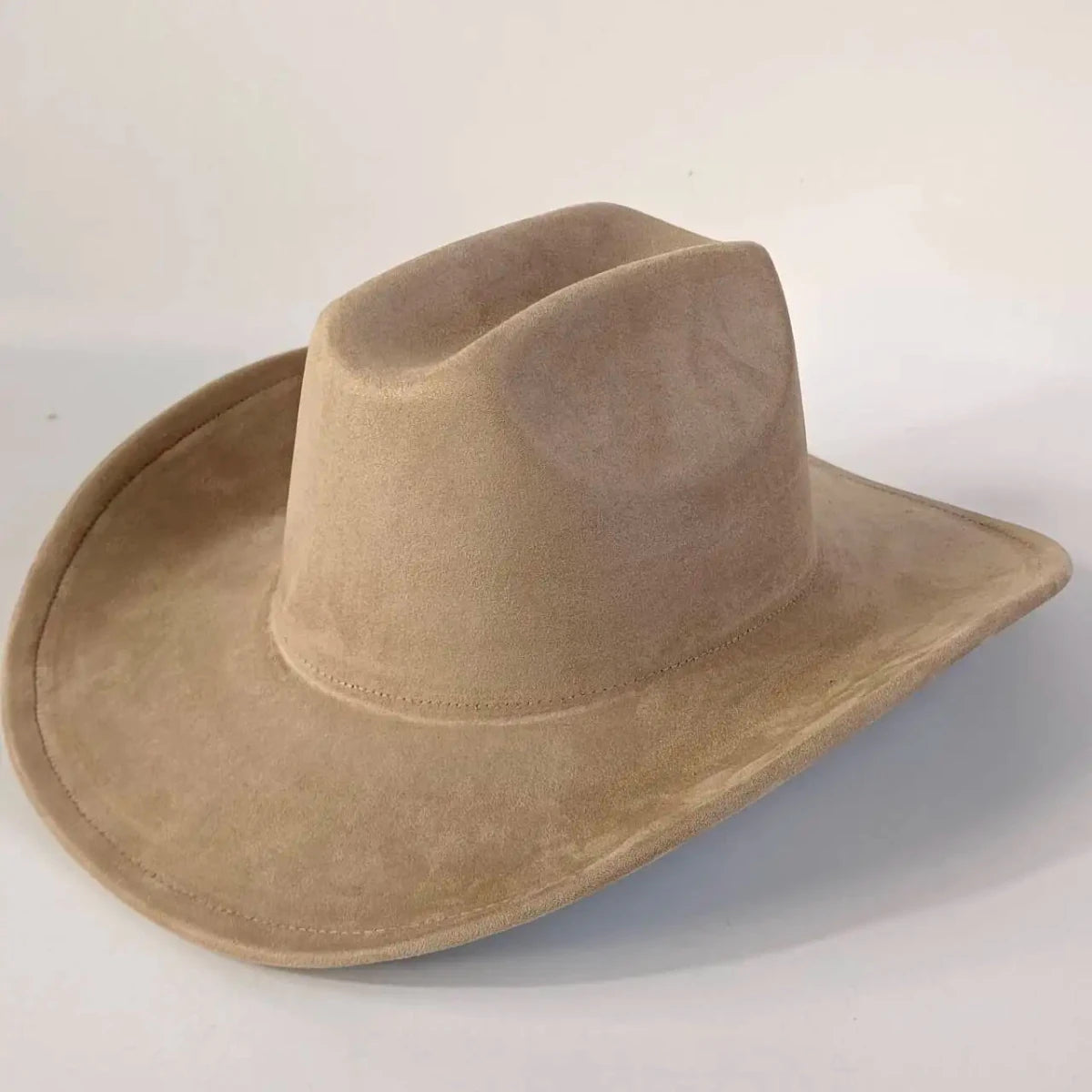 Premium suede cowboy hat by MANDOTOS INTERNATIONAL, stylish unisex hat with wide brim, perfect for outdoor festivities and outdoor wear.