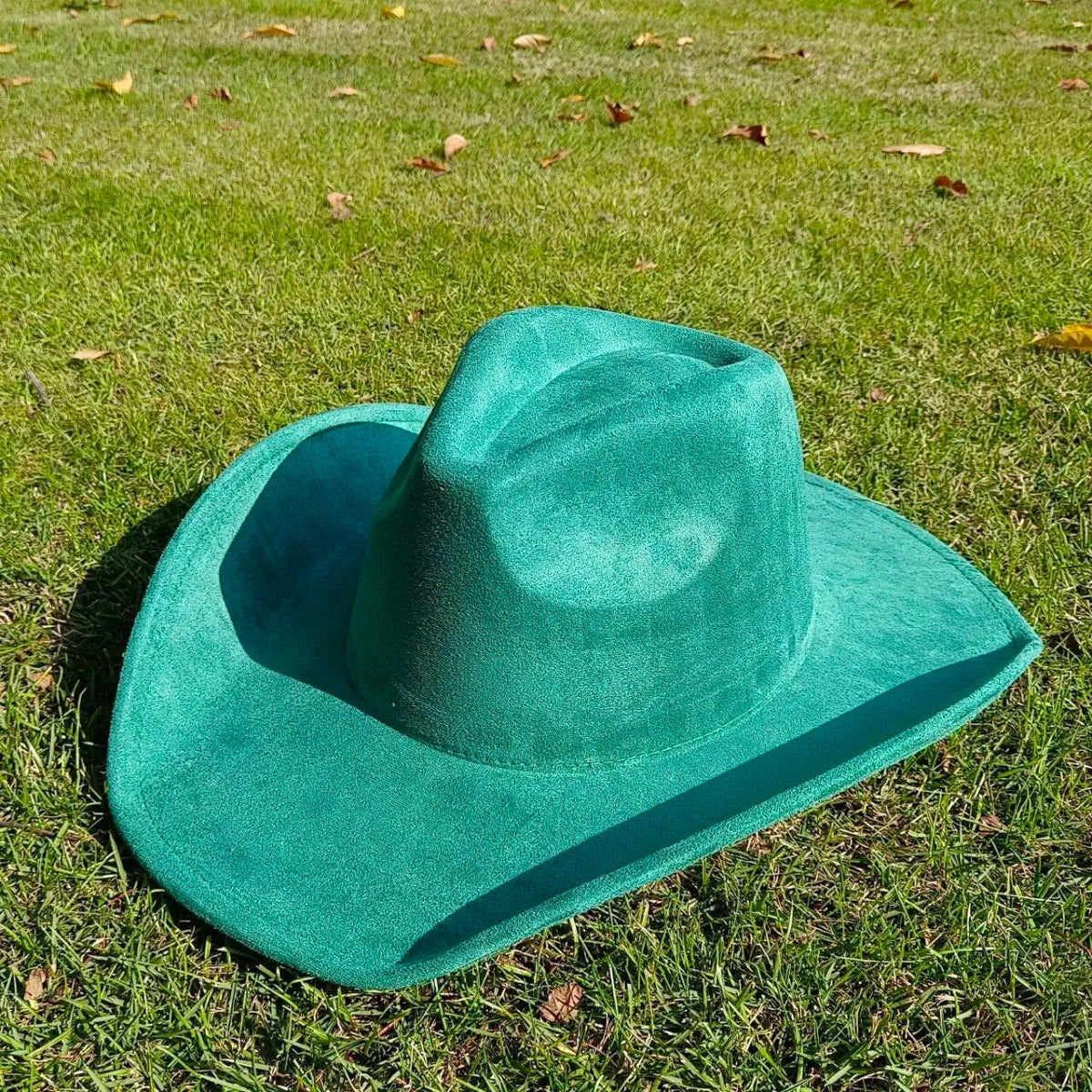 Premium suede cowboy hat by MANDOTOS INTERNATIONAL, stylish men and women outdoor hat with wide brim and classic western design.