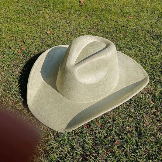 Premium suede cowboy hat by MANDOTOS INTERNATIONAL, stylish accessory for men and women, perfect for outdoor festivities.