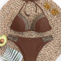Push-up bikini set for women with thong design, halter neck, Brazilian style, from MANDOTOS INTERNATIONAL, ideal for beach swimming.