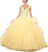 Elegant yellow Quinceanera prom gown by MANDOTOS INTERNATIONAL featuring intricate details and flowing fabric.