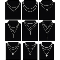 Mandotos International retro geometric pendant necklace featuring bold shapes, perfect for trendy travel dates and stylish outfits.