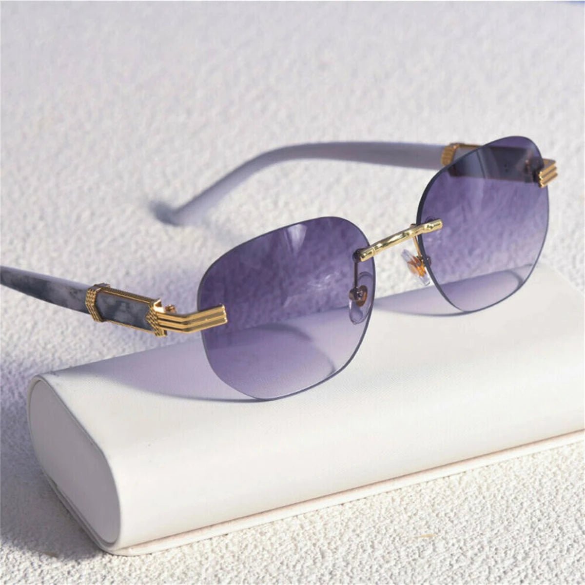 Retro square hip hop sunglasses with gold rimless frames, stylish unisex fashion accessory by MANDOTOS INTERNATIONAL.