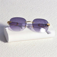 Retro square hip hop sunglasses with gold rimless frames, unisex fashion sunglasses by MANDOTOS INTERNATIONAL.