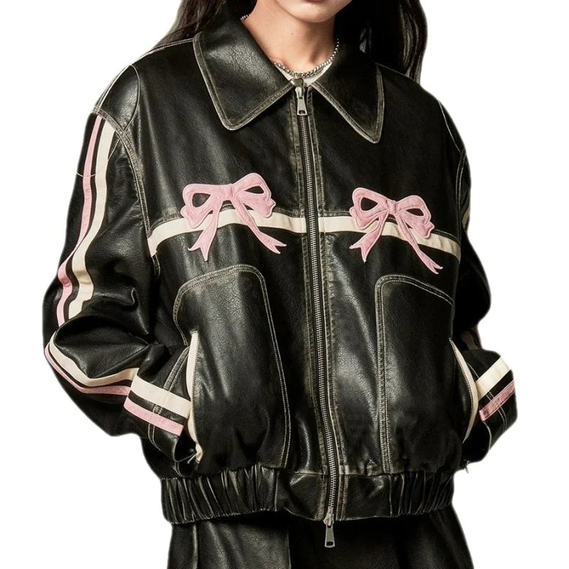 Mandotos International Rider's Bow Leather Jacket featuring a sleek black design and classic motorcycle style.