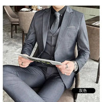 Mandotos International men's formal dress suit including blazer, vest, and pants in S-9XL size, professional business attire.