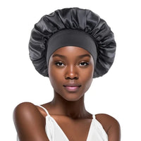 Silk wide-brimmed satin sleep bonnet for women, designed for hair care and protection during sleep by Mandotos International.