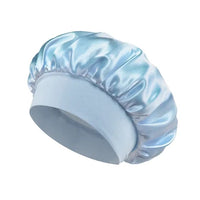 Silk wide-brimmed sleeping bonnet for women, satin hair care sleep cap, adjustable fit, protects hair overnight.