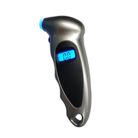 Mandotos International Smart Tire Pressure Monitor displaying digital readout on a vehicle dashboard.
