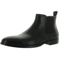Steve Madden Duke leather Chelsea boots in size 9.5, black with elastic side panels and sleek design.