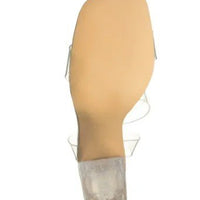 Steve Madden Lucid Dream heel sandal featuring a sleek design with a high heel and stylish straps, perfect for elegant occasions.