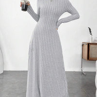 Mandotos International stylish high collar winter dress with long sleeves and elegant design, perfect for cold weather fashion.