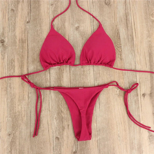Mandotos International summer solid micro bikini set for women, featuring tie-side G-string thong and Brazilian-style bandage swimsuit.
