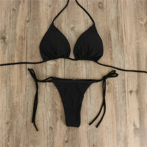 Solid micro bikini set with tie-side G-string design, featuring bandage style, ideal for Brazilian swimwear and summer beachwear.