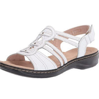 Trendy women's beach sandals by MANDOTOS INTERNATIONAL featuring colorful straps and comfortable flat sole.