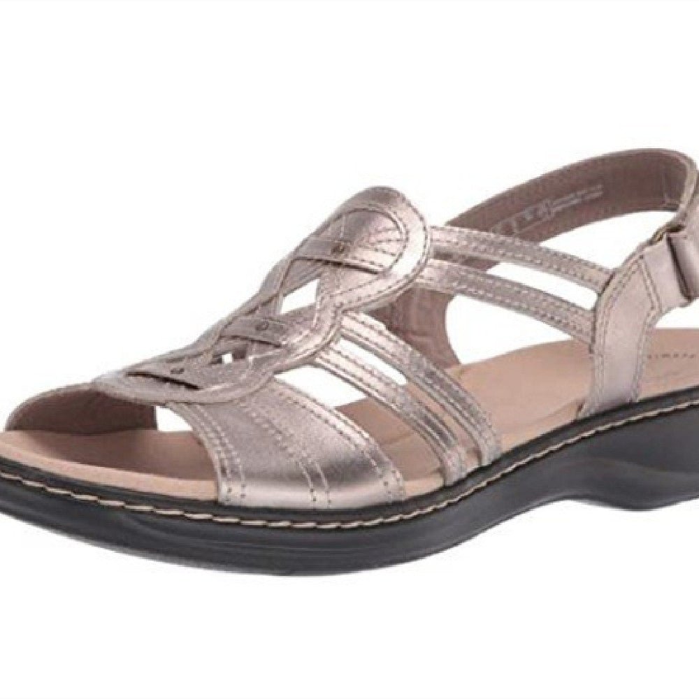 Trendy women's beach sandals by MANDOTOS INTERNATIONAL featuring comfortable straps and casual summer style.