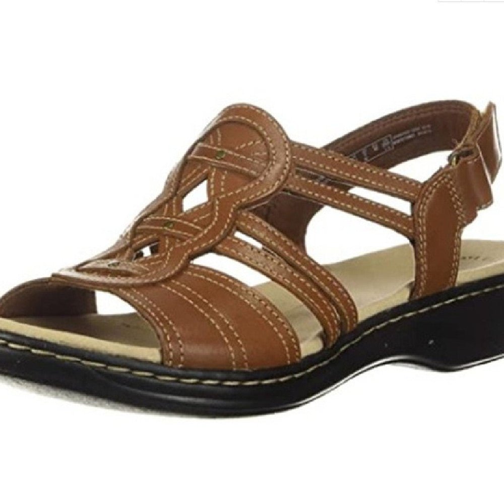 Trendy women's beach sandals by MANDOTOS INTERNATIONAL featuring comfortable straps and stylish design for summer outings.