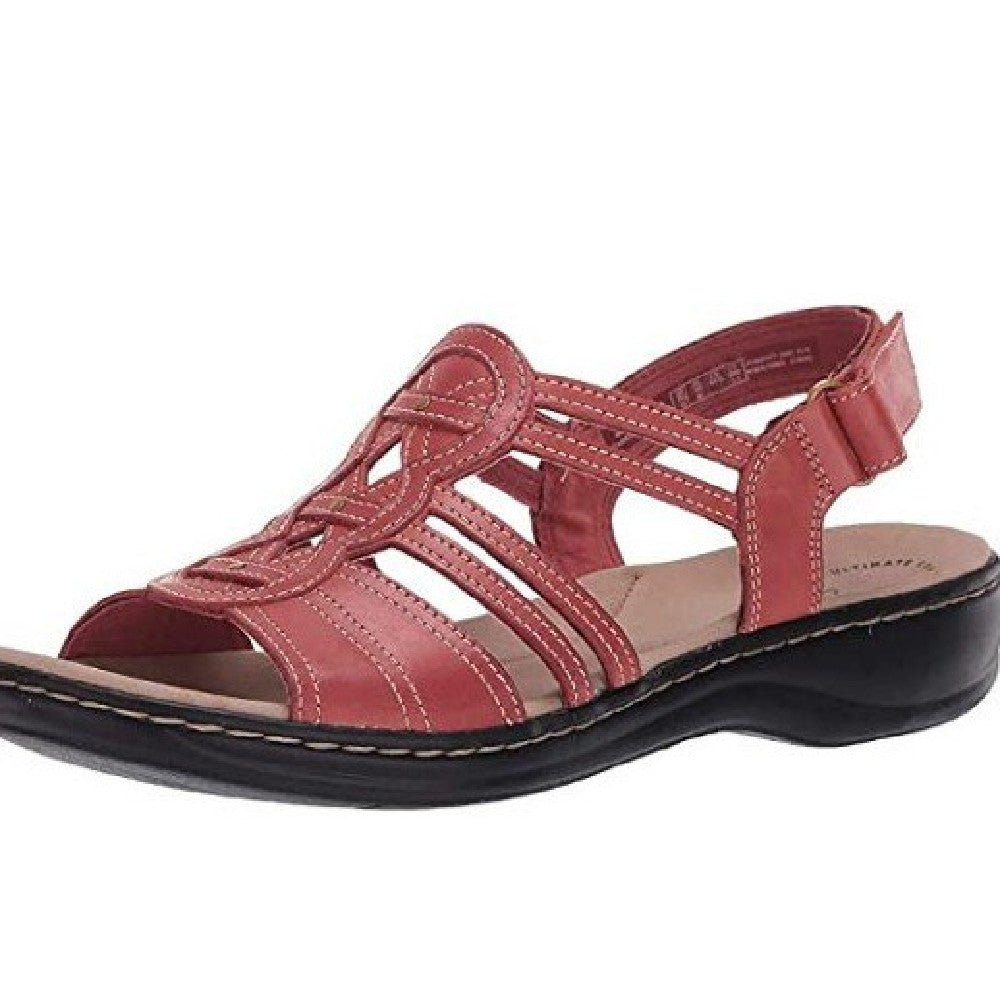 Trendy women's beach sandals by MANDOTOS INTERNATIONAL featuring stylish straps and comfortable soles for summer wear.