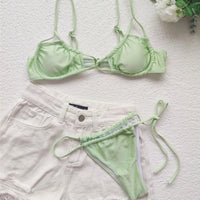 Mandotos International unique thong bikini with lace-up design, two-piece swimwear for women, perfect for beach and swimming.
