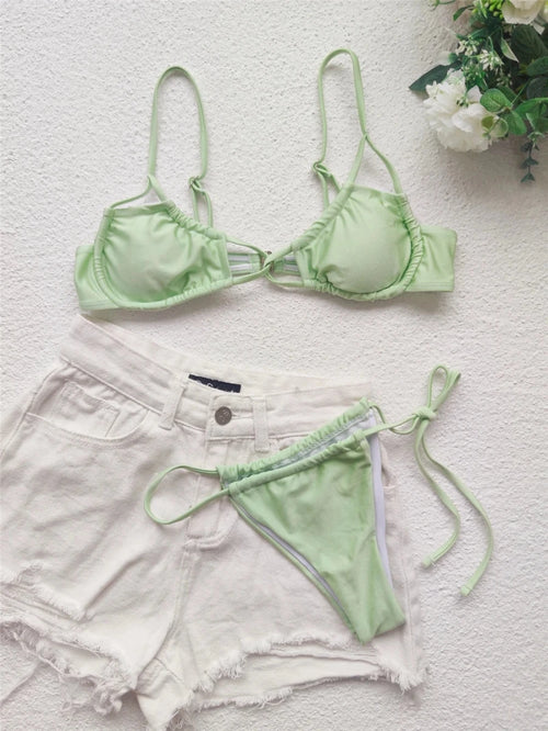 Mandotos International unique thong bikini with lace-up design, two-piece swimwear for women, perfect for beach and swimming.