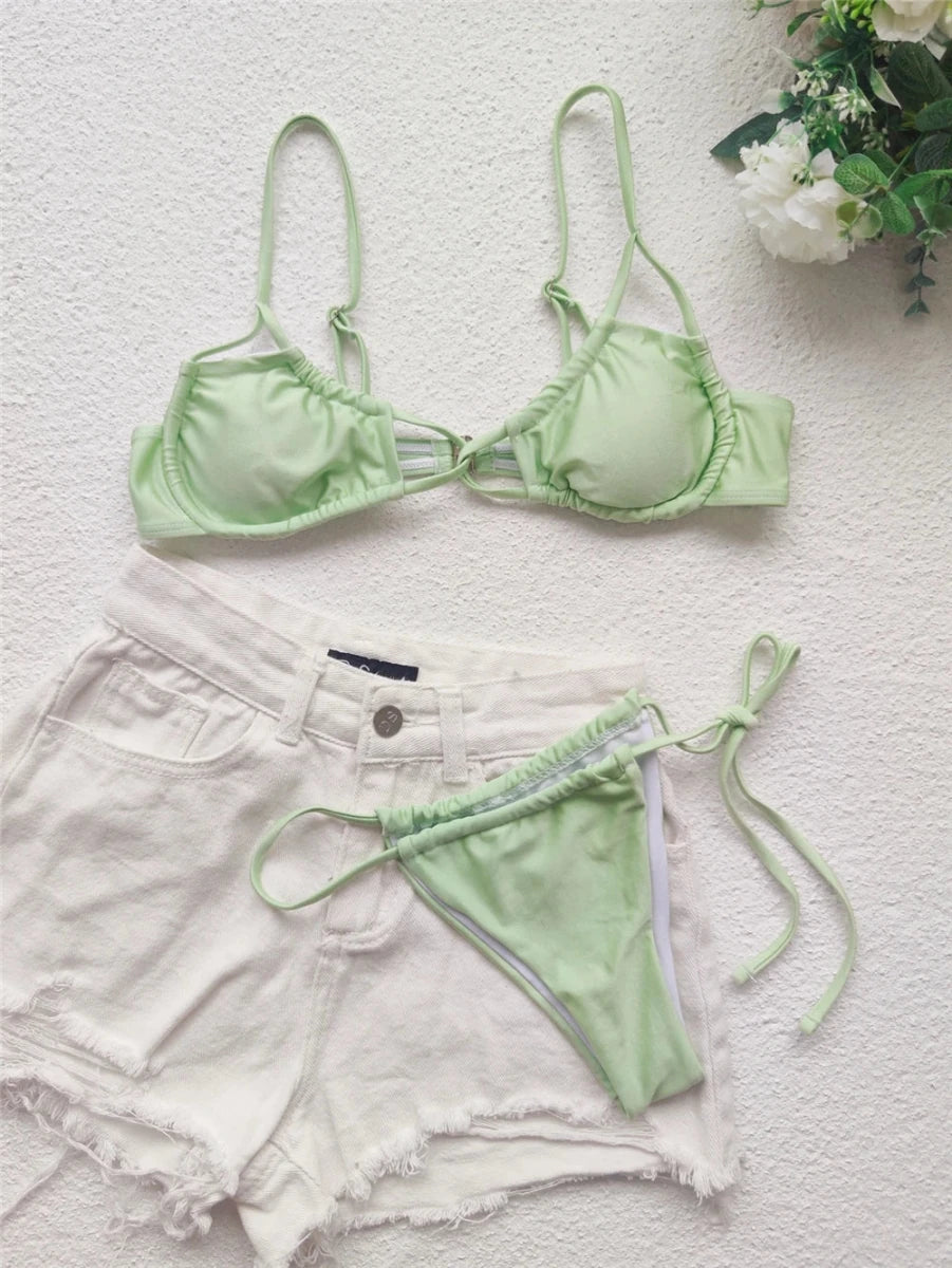 Mandotos International unique thong bikini with lace-up design, two-piece swimwear for women, perfect for beach and swimming.